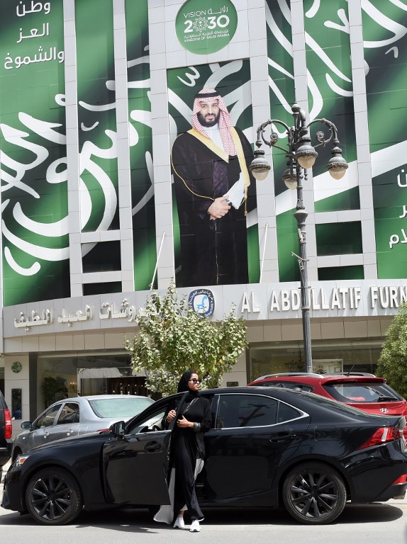 Women in Saudi Arabia officially drive for the the first time after lifting long-ban on female drivers. (Photo: AFP)